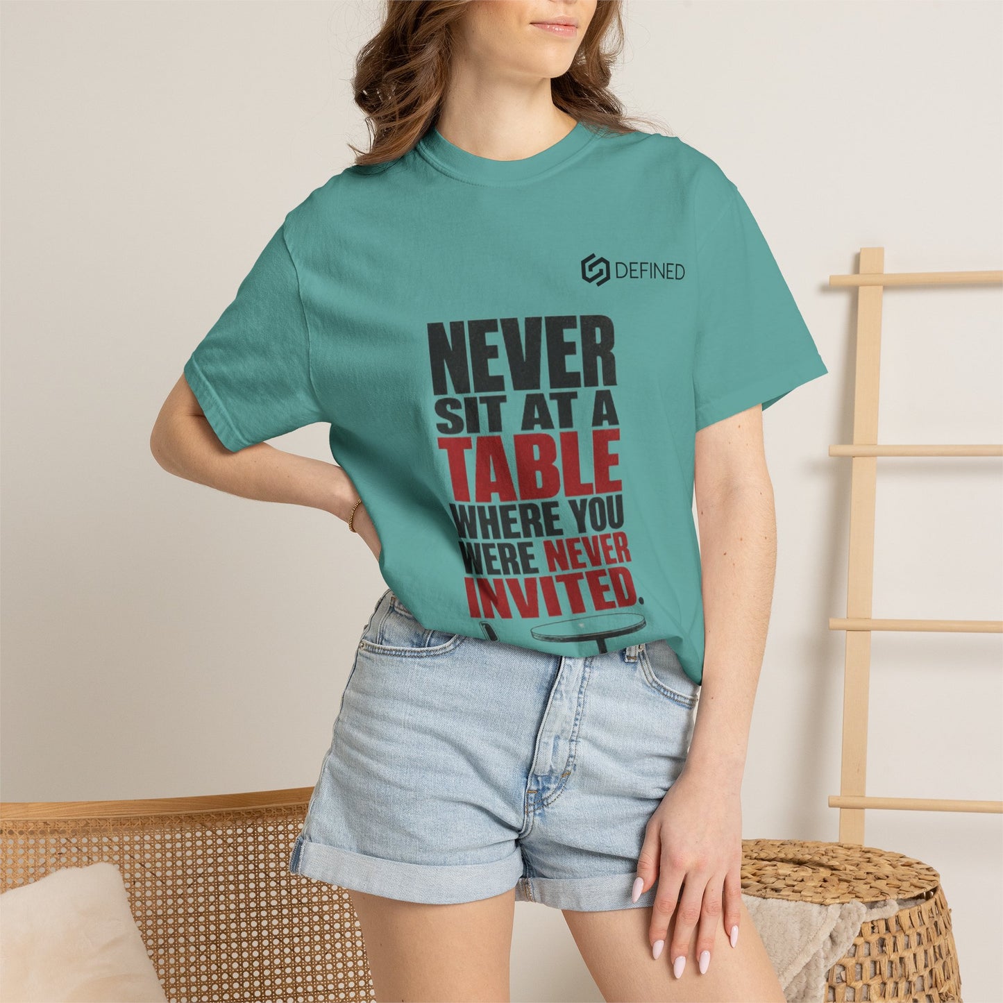 T-Shirt — "Never Sit at a Table Where You Were Never Invited" Motivational Graphic Tee