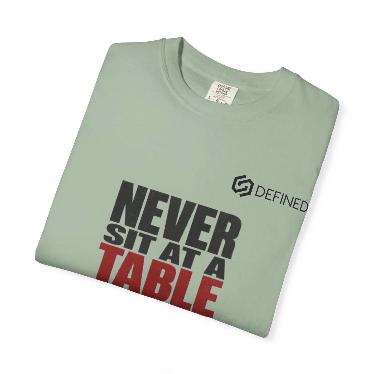 T-Shirt — "Never Sit at a Table Where You Were Never Invited" Motivational Graphic Tee