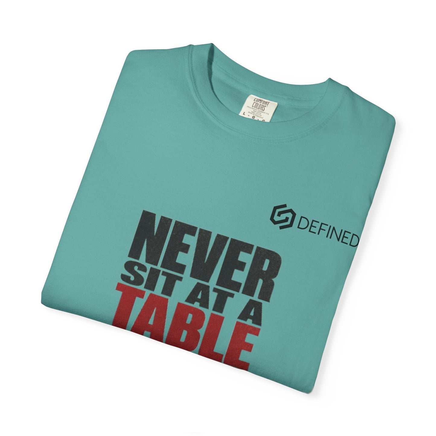 T-Shirt — "Never Sit at a Table Where You Were Never Invited" Motivational Graphic Tee
