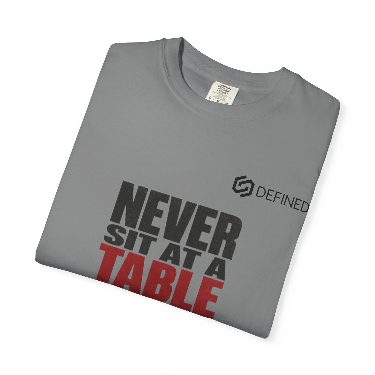 T-Shirt — "Never Sit at a Table Where You Were Never Invited" Motivational Graphic Tee