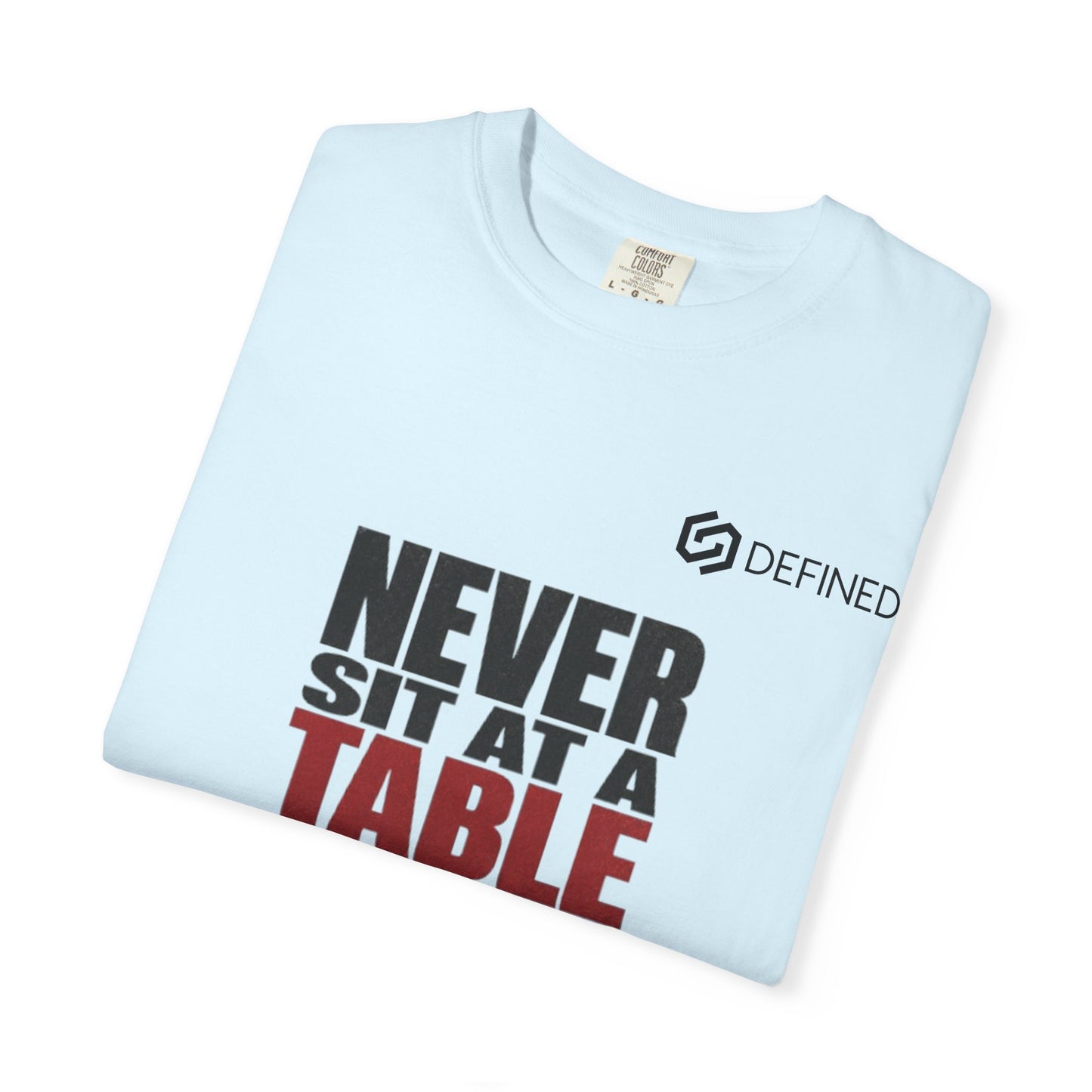 T-Shirt — "Never Sit at a Table Where You Were Never Invited" Motivational Graphic Tee